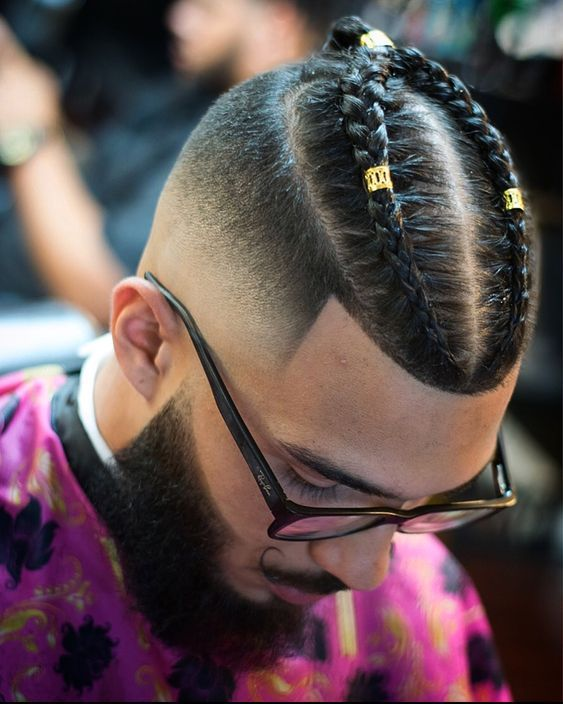 Picture showing a guy rocking a stylish braid