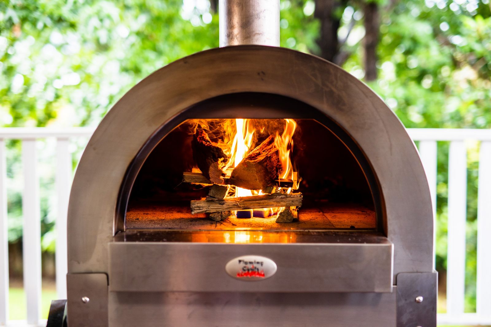 This_image_shows_fire_started_on_the Wood_fired_pizza_oven