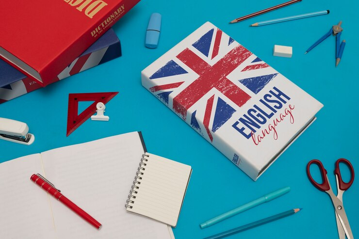 English language book and notebook, essential tools for effective revision. Caption: Unlocking A* potential with focused English Language revision!