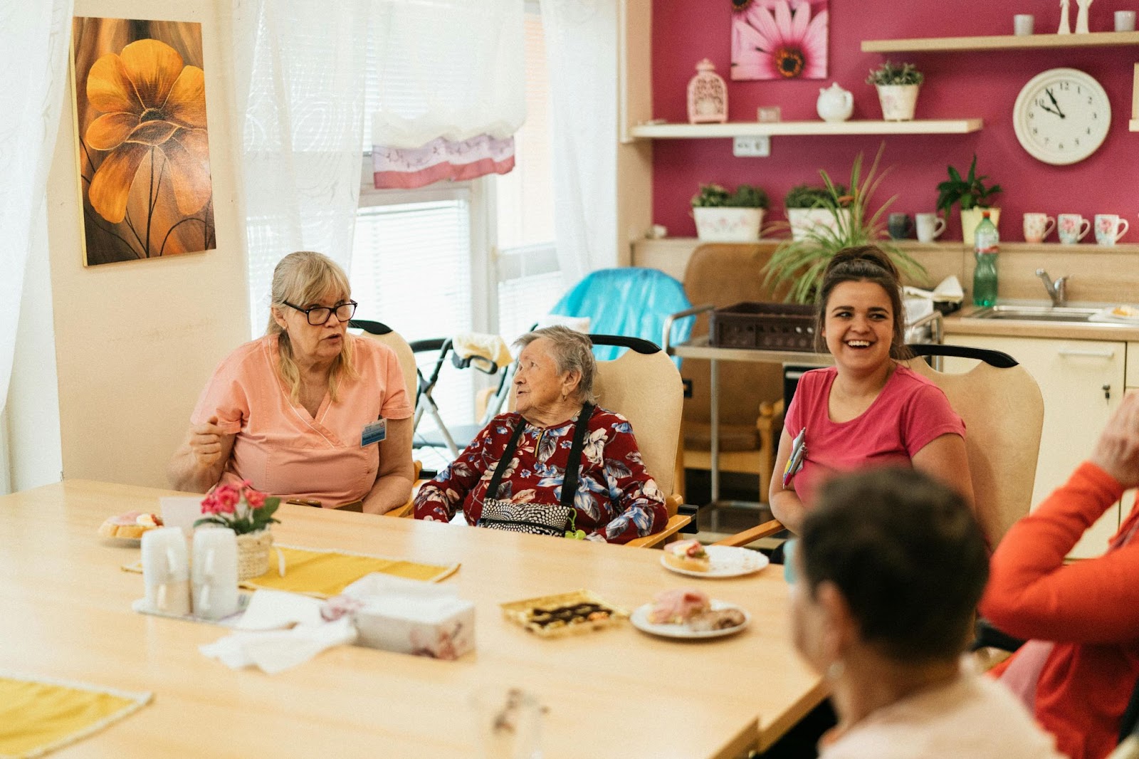 Elderly women having breakfast in a nursing home