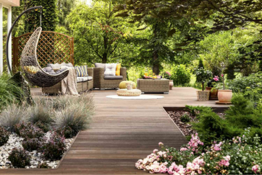 top ways to design your deck for hosting strategic greenery placement landscaping with outdoor furniture custom built michigan
