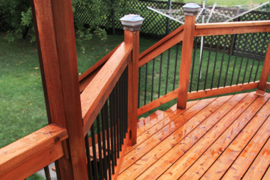 tips for choosing the best deck railing for your build wet wood rails after rain custom built michigan