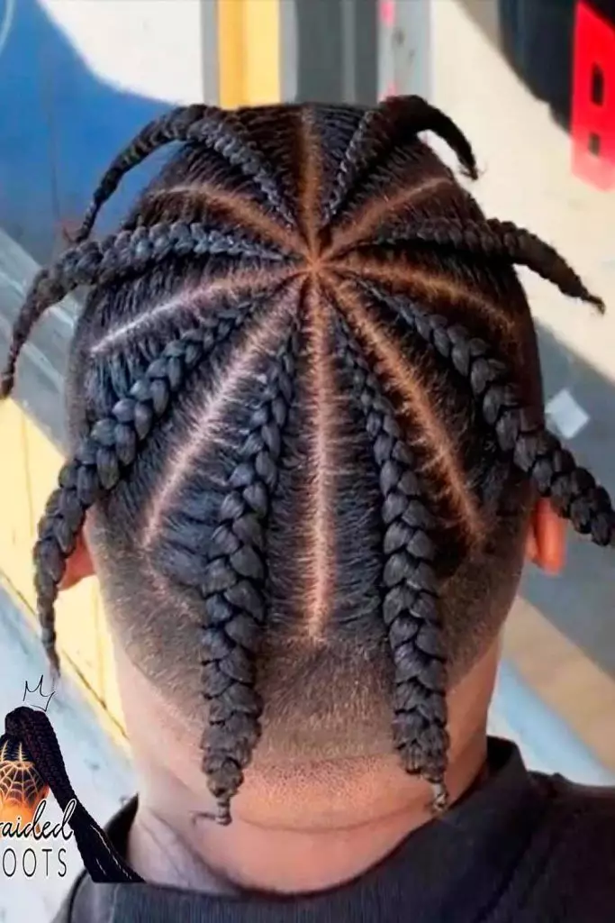 Back view of a guy rocking his pop smoke braids with style