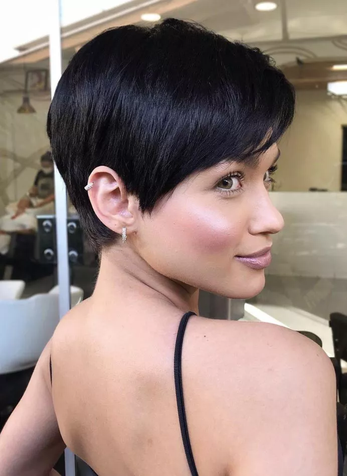 Side view of a lady rocking a sculpted crop cut