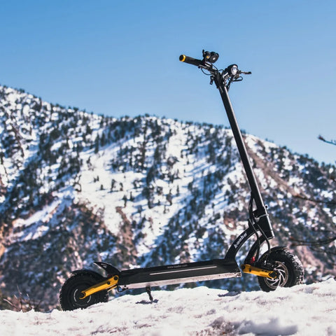 electric scooter in winter mountains