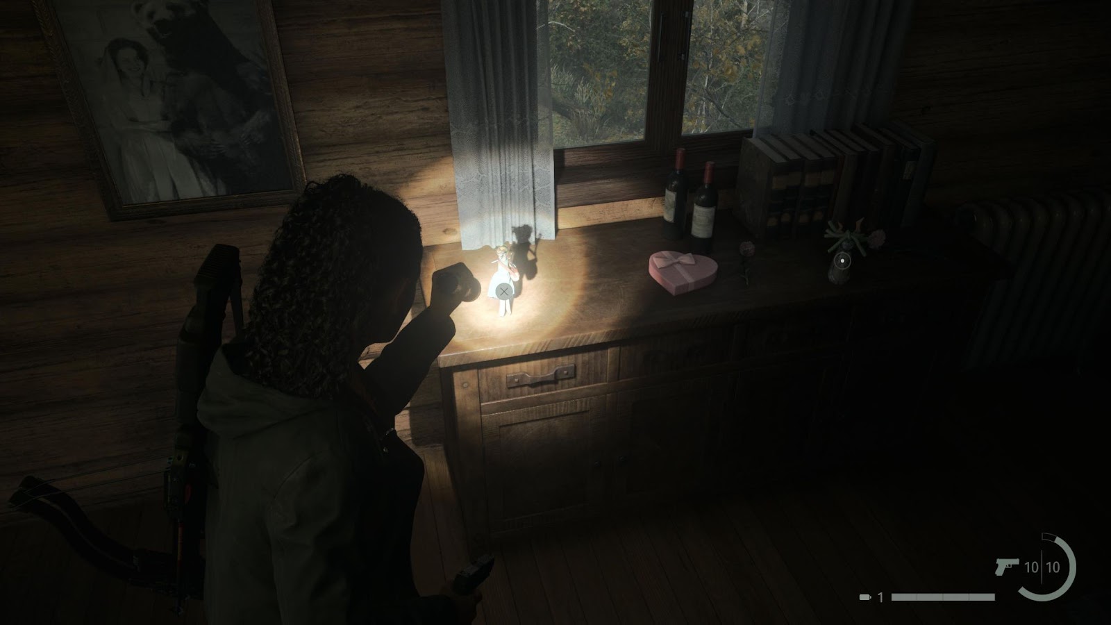 An in game screenshot of the Maiden doll from Alan Wake 2. 