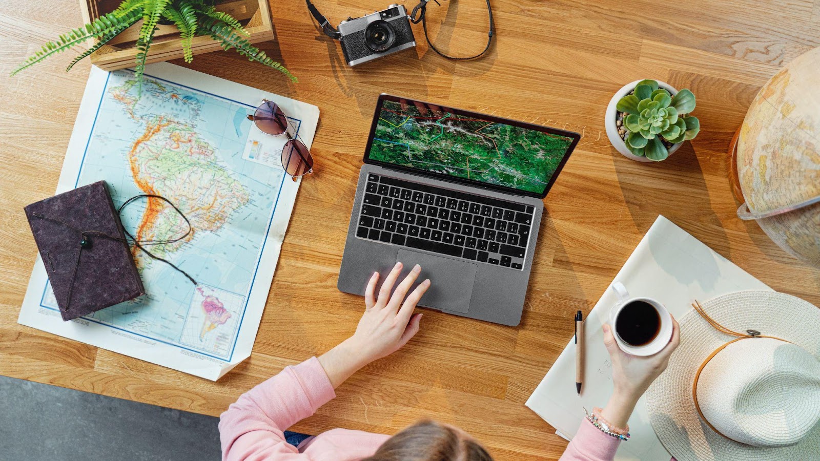 map and laptop on the table