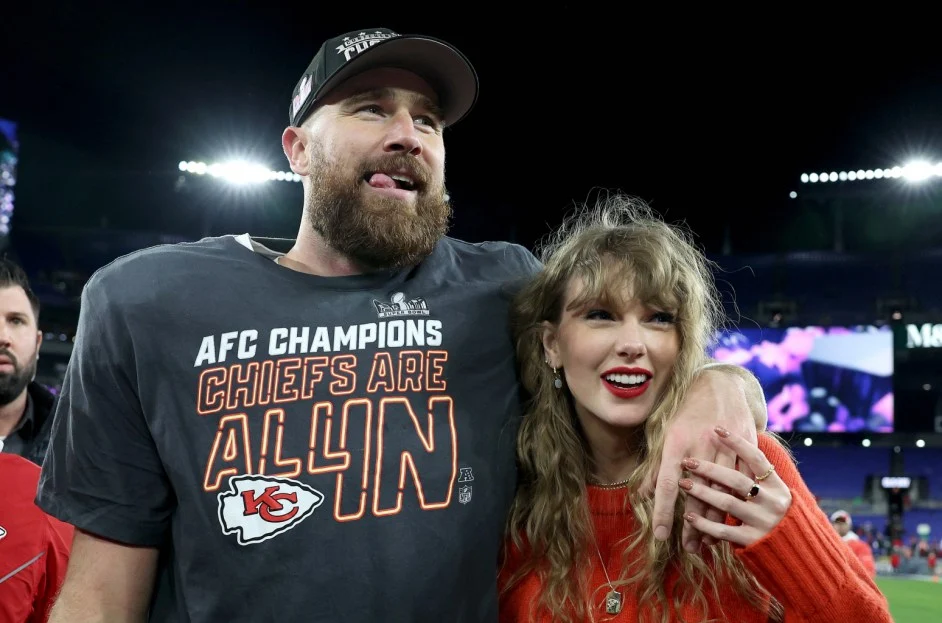 Travis Kelce of the Kansas City Chiefs celebrates with Taylor Swift after a 17-10 victory against the Baltimore Ravens in the AFC Championship Game at M&T Bank Stadium on Jan. 28, 2024 in Baltimore, Maryland. | Patrick Smith/Getty Images