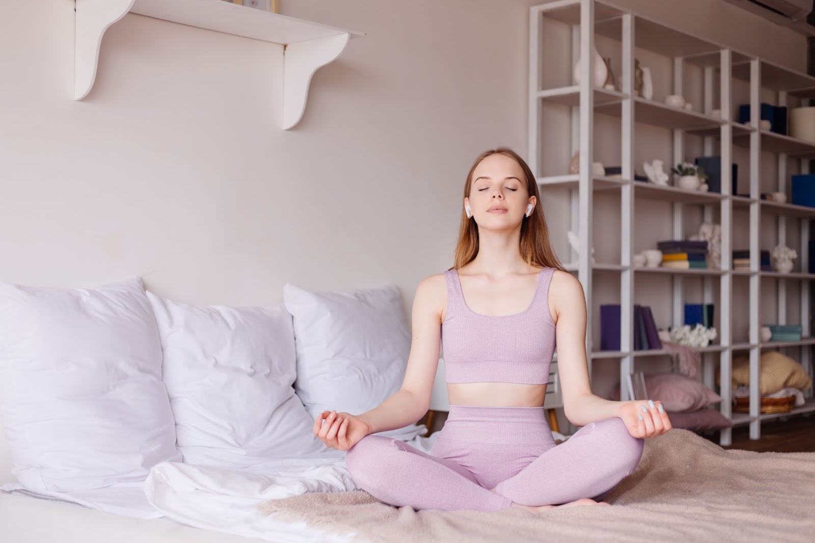 Woman practicing yoga before sleep