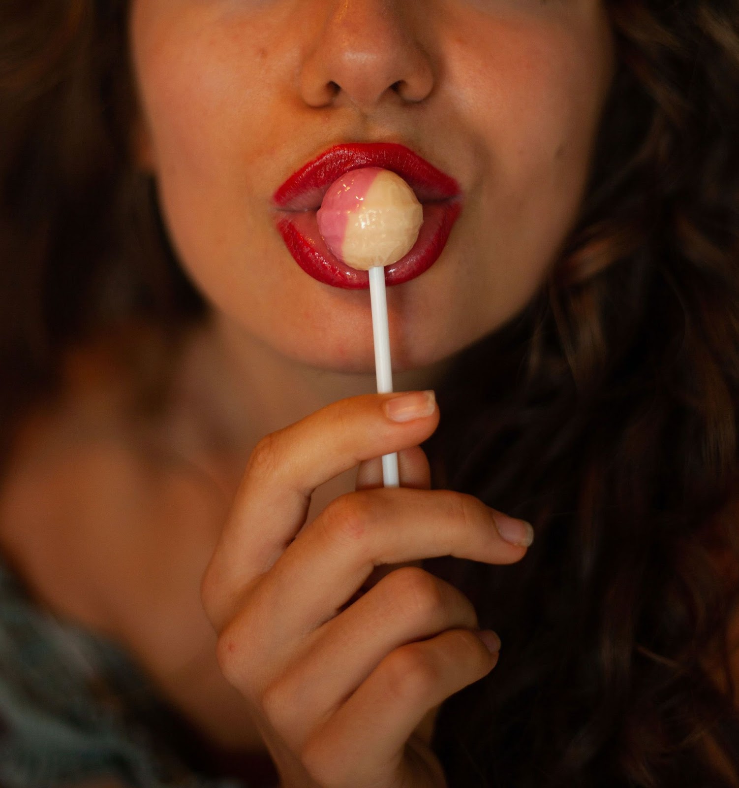 provocative image of a woman with a lollipop 