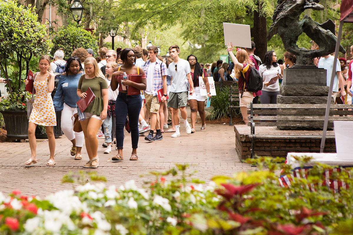 Image of students participating in interactive orientation activities at the Medical University of South Carolina (MUSC), promoting a welcoming atmosphere for new students.