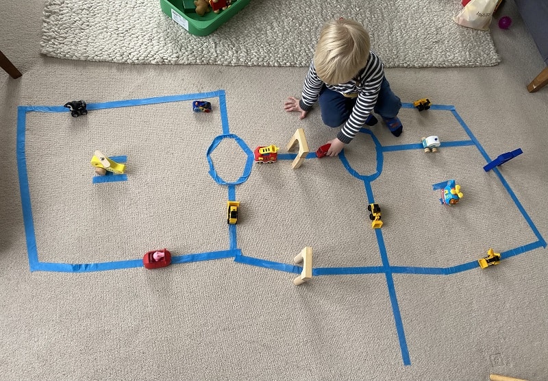 Making a road using painter's tape & gross motor activity for toddlers at home