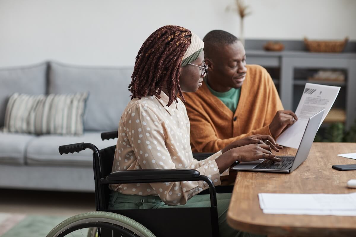 ADA confidentiality requirements: employee in a wheelchair working from home