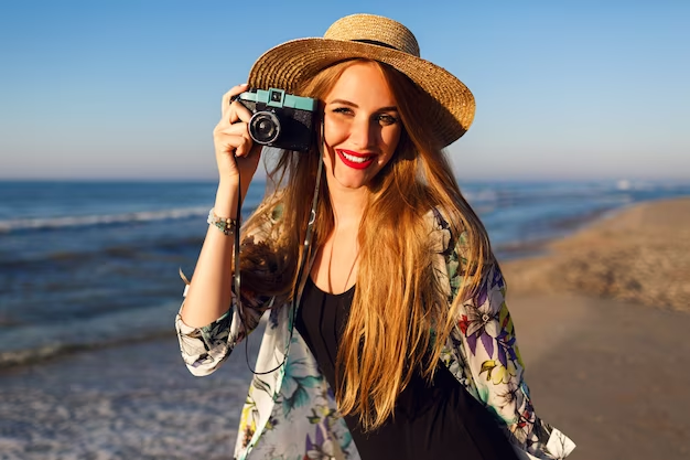 A Girl With Unaplogetic & Cutie Pose Holding a Camera in Her Hand