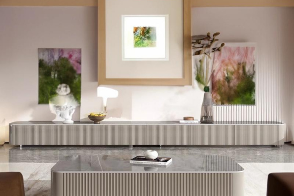 Solid wood TV cabinet in cream white with storage, featuring a beadboard design and marble-like glossy slate table top. 