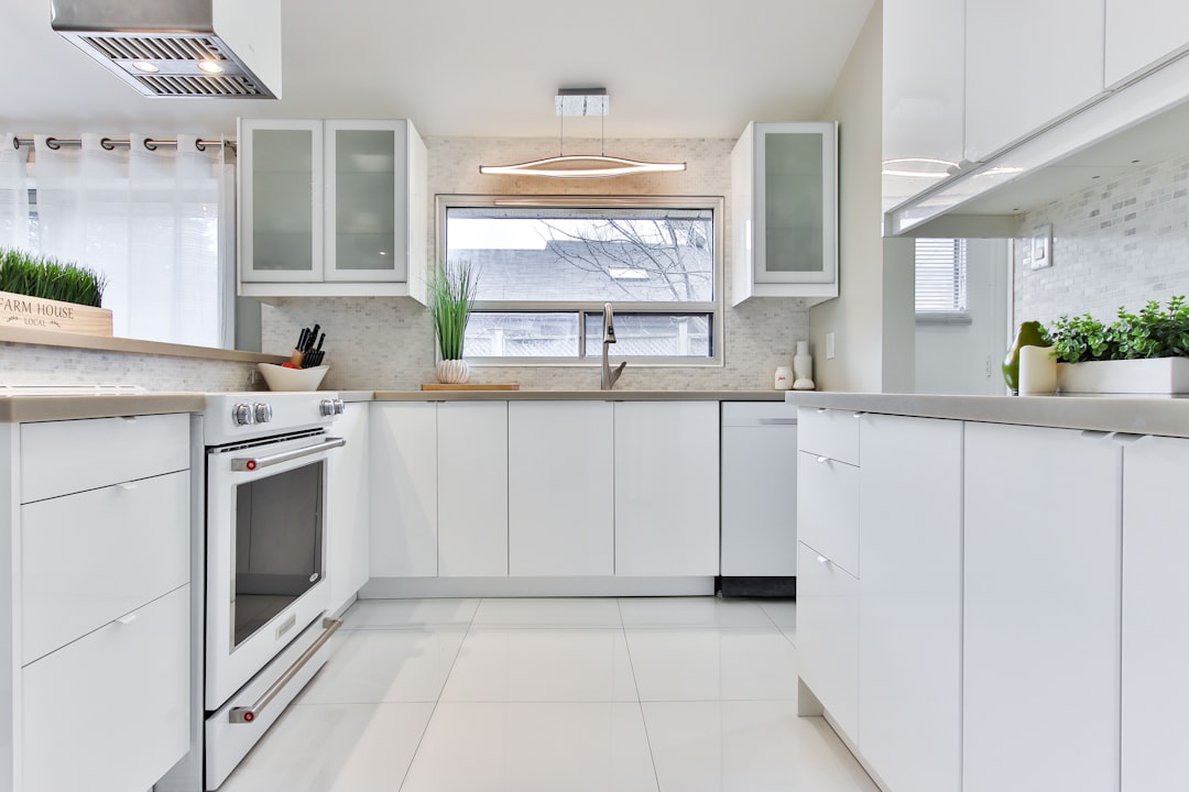 white wooden kitchen cabinet with sink