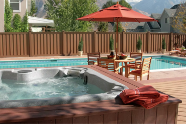 michigan average deck and backyard privacy costs 2025 trex fencing with pool and hot tub custom built mi