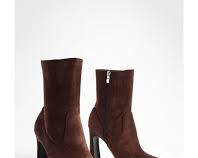 Image of closefitting pointedtoe ankle boots