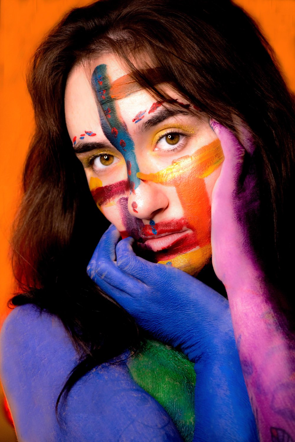 Photograph of Painted Woman by Lauryn Garrison.