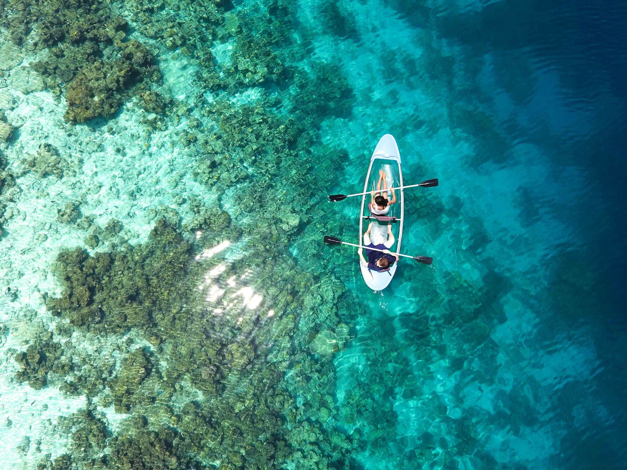 Kayaking in Maldives with a view. Photo Credit: Asad Photo Maldives via Pexels