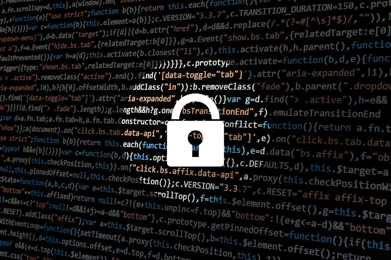A digital padlock icon centered over a background of computer code.