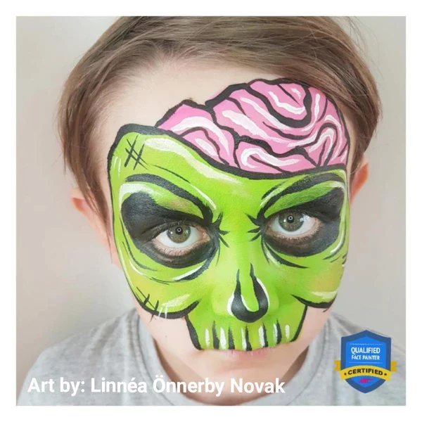 Picture of a young boy rocking the zombie face paint idea