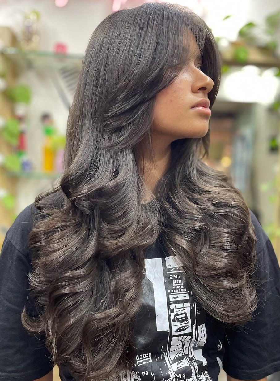 Picture of a lady wearing Soft Layered Long Curls