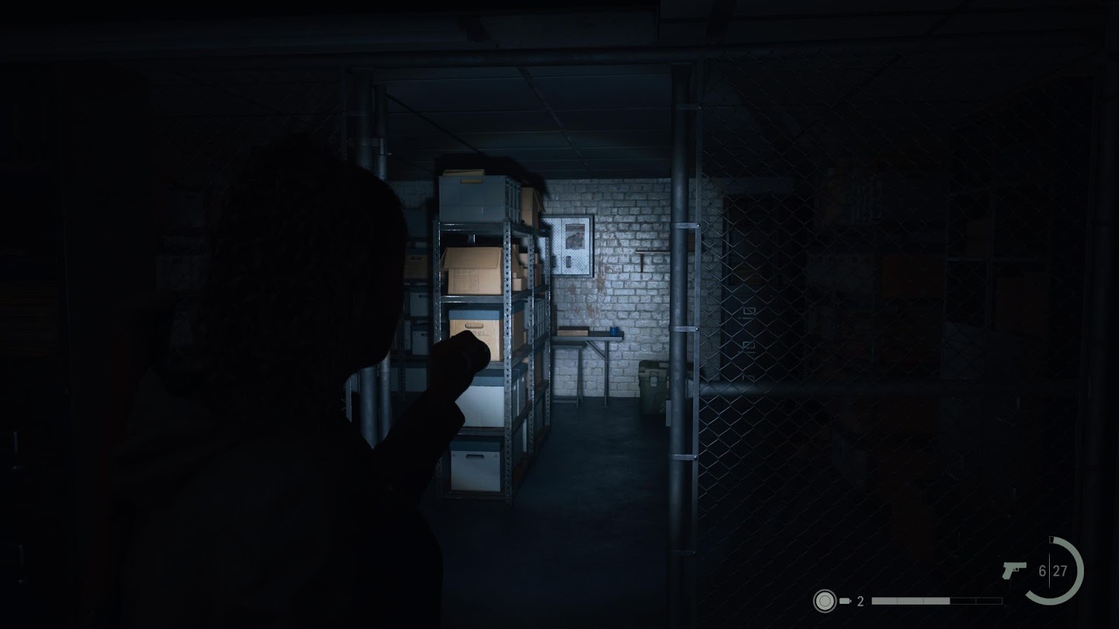 An in game screenshot of the evidence room at Bright Falls Sheriff Station in Alan Wake 2. 
