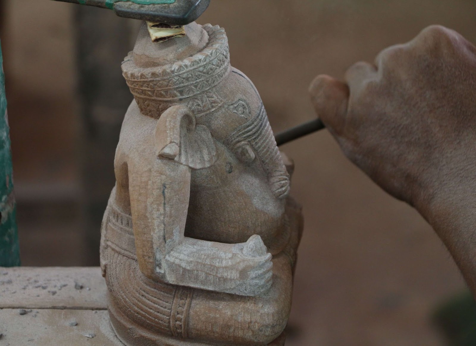This is a close-up of a intricate carvings of Lord Ganesh at Artisan Angkor.