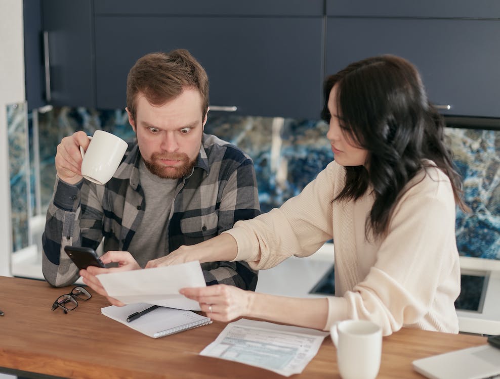 Free Shocked Man Looking at the Paper Stock Photo