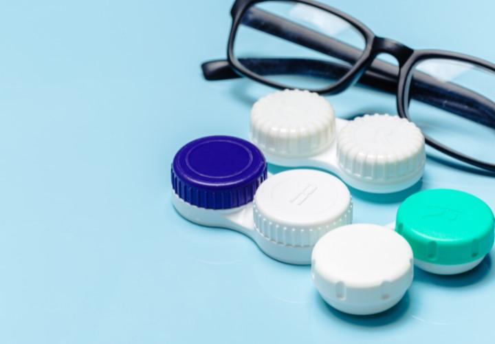 A contact lens case and glasses

Description automatically generated