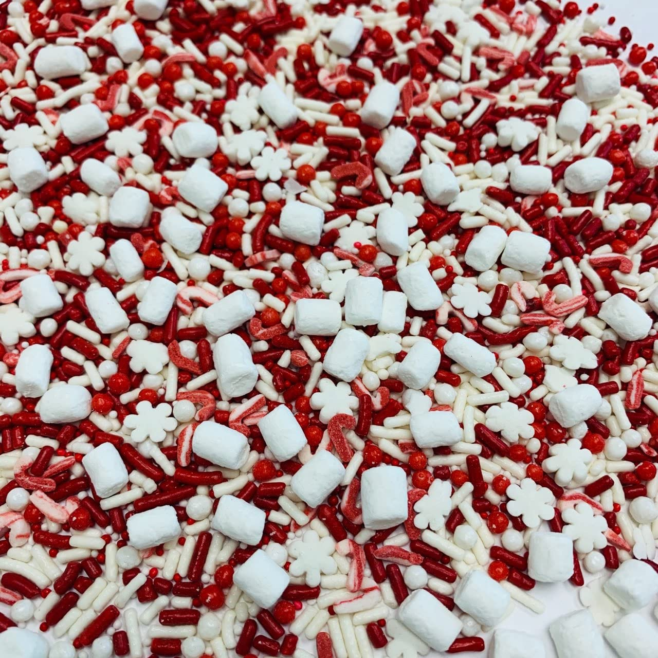 mini marshmellows and candy cane