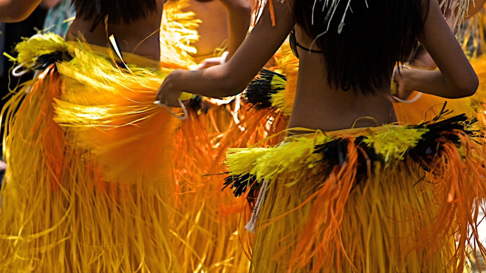  Colorful Hawaiian luau with traditional dancers and live music.