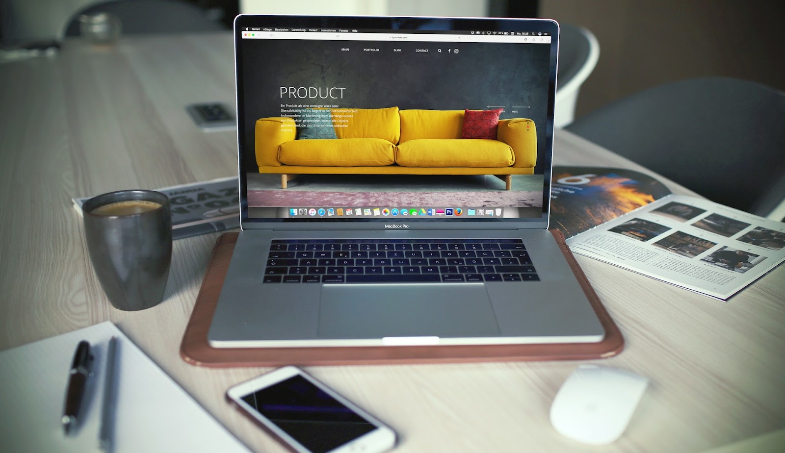 An image of a laptop showing a sofa as their product