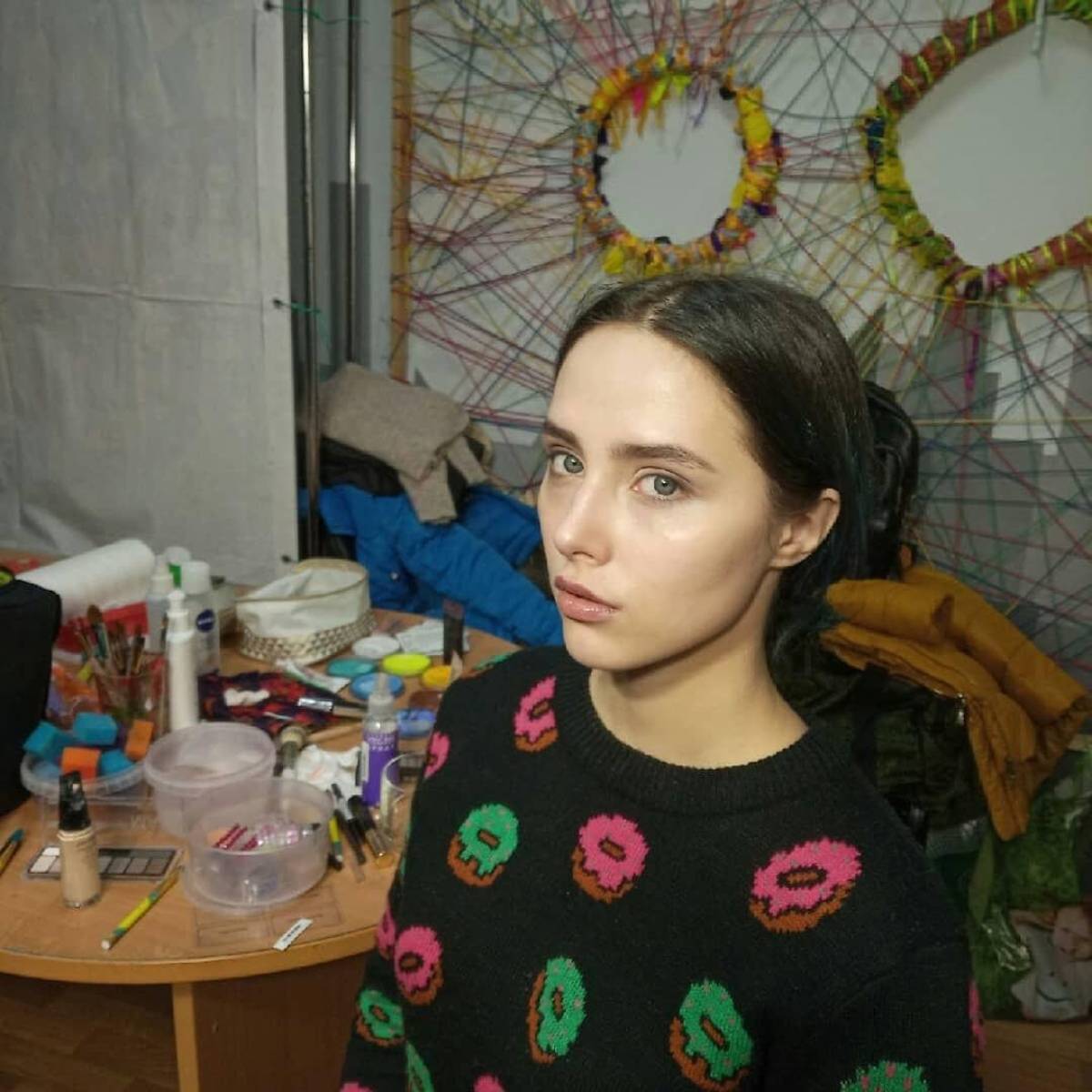 Masha Babko at her makeup table