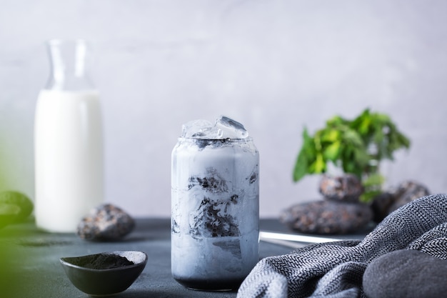 Premium Photo | Black iced activated charcoal latte detox drink