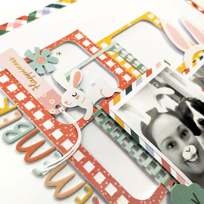 A scrapbook page with bunny ears and pictures

Description automatically generated