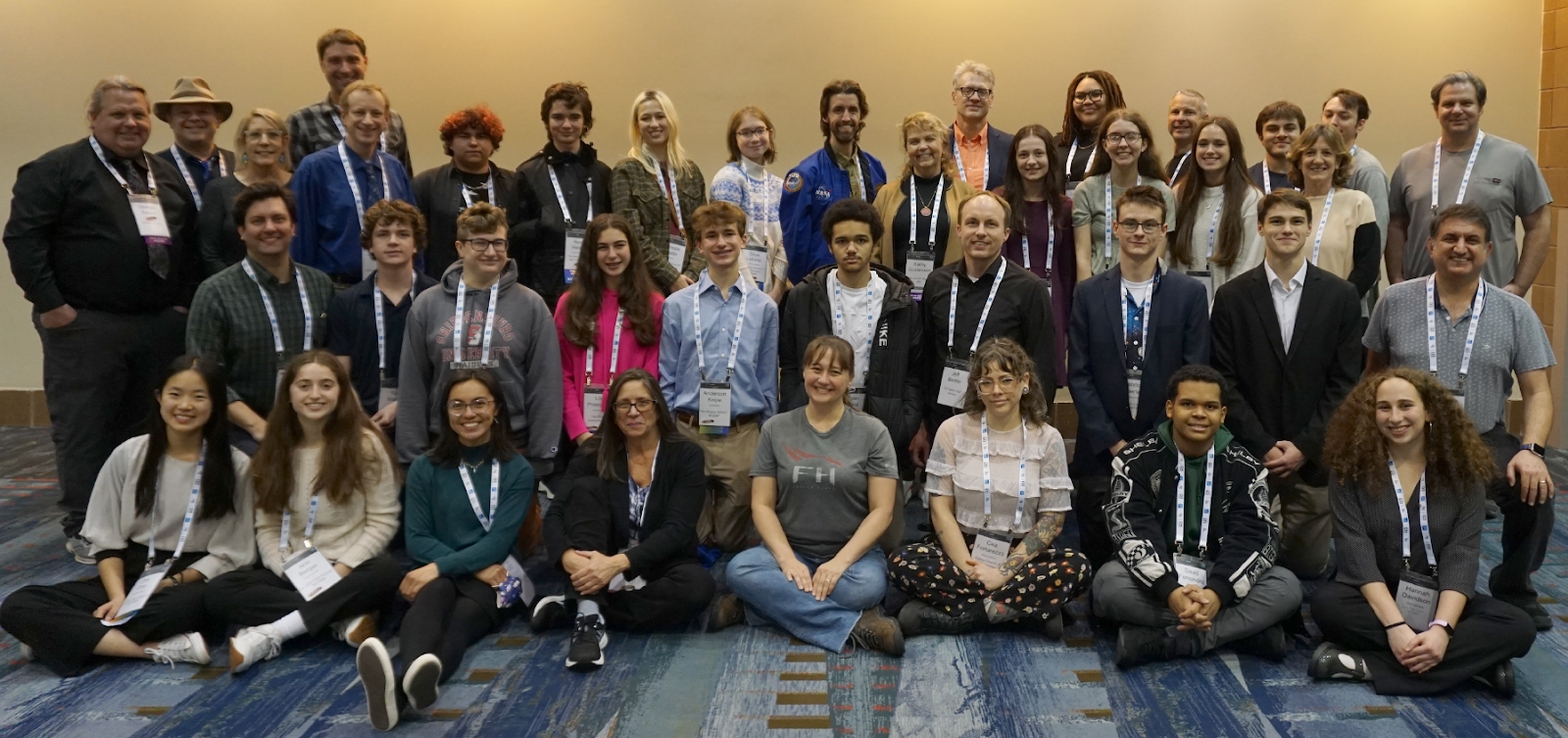 Caption: (David Forester. Back row, middle, in blue jacket)