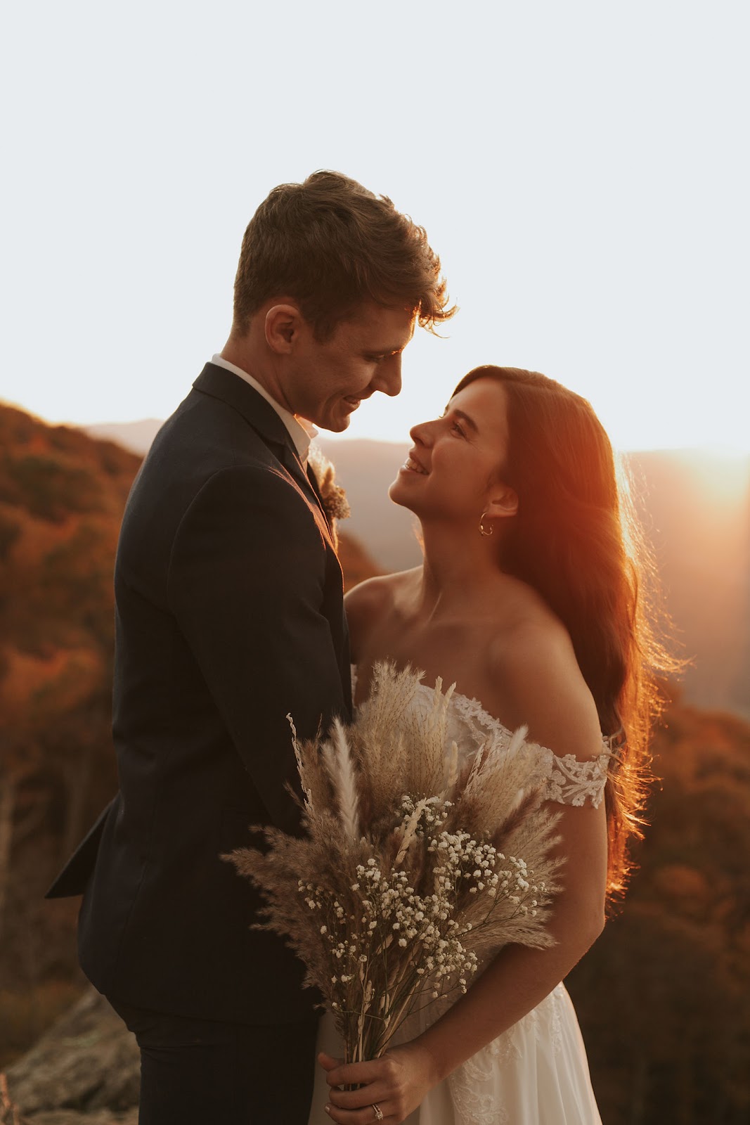 Bride and groom pose for wedding elopement portraits at Raven's Roost in the Blue Ridge Mountains of Virginia