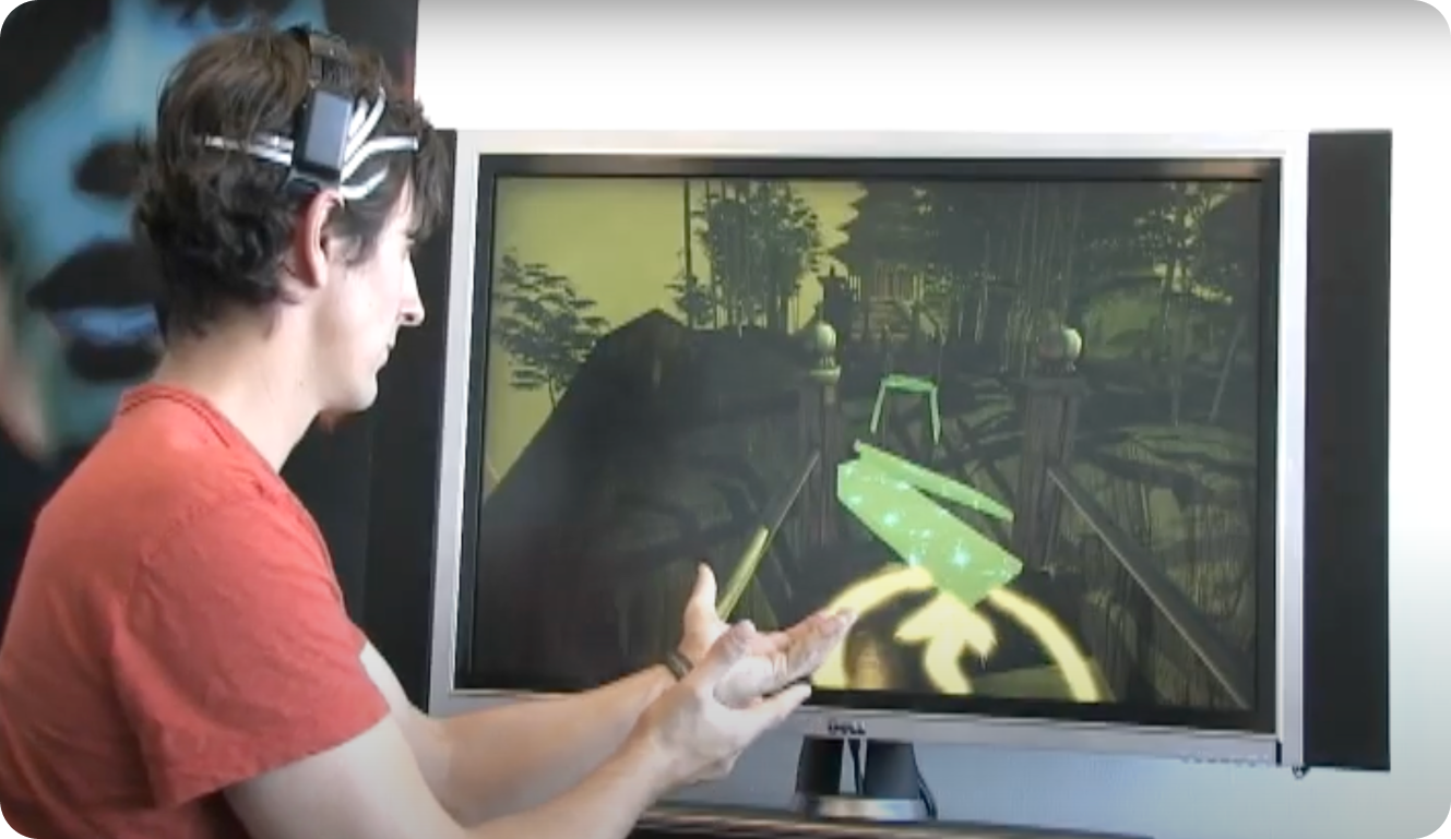 The original EPOC prototype demonstrating its seamless BCI video game integration