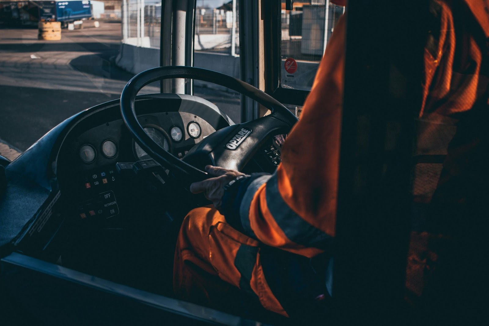Picture of a driver behind a forklift steering wheel