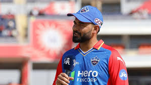 Pant during the toss in his come back match against PBKS