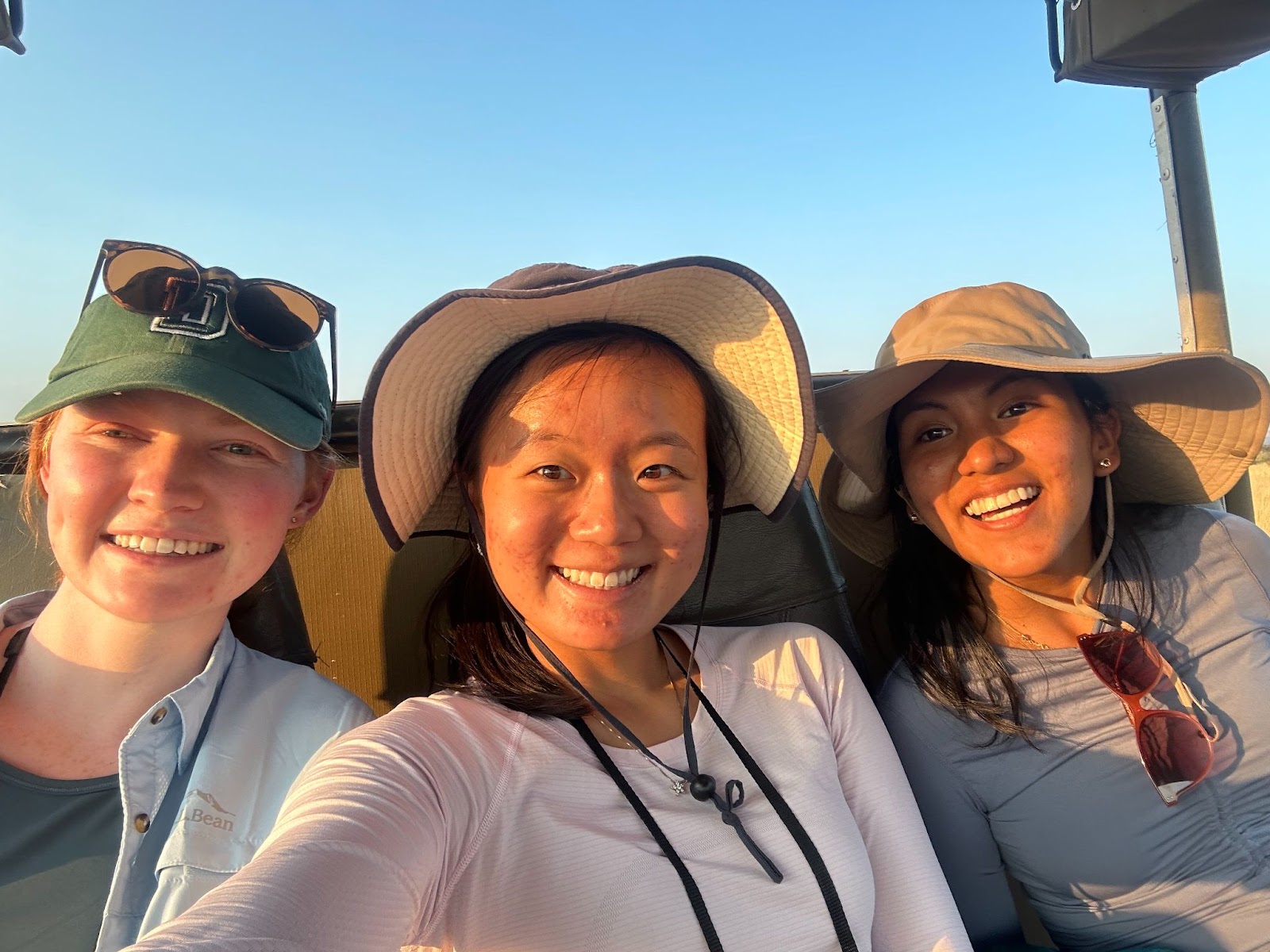 A selfie with myself and two other girls on the back of the game drive vehicle.