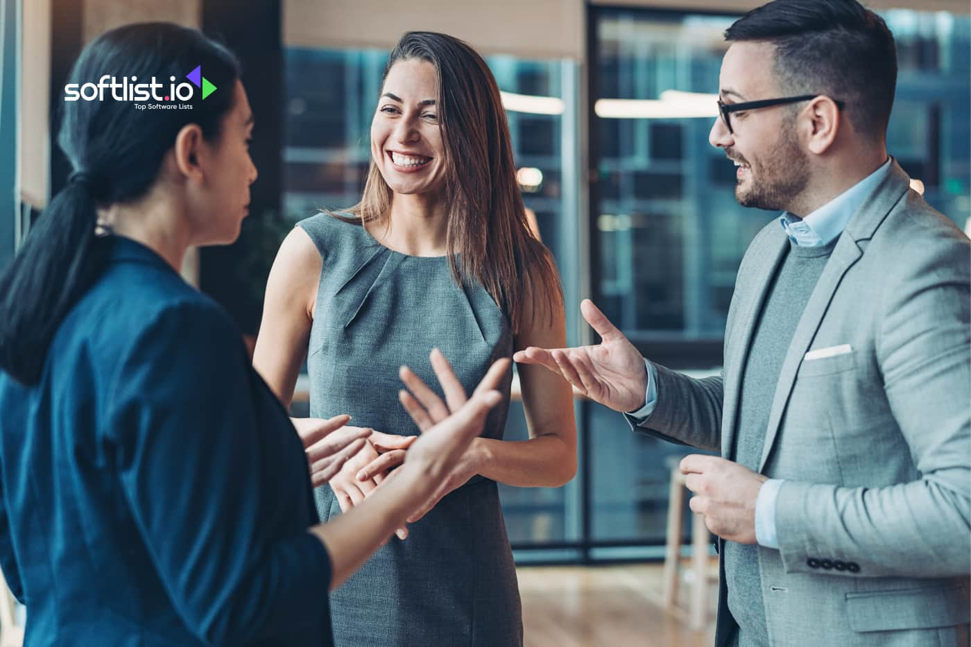 three business people having conversation about business