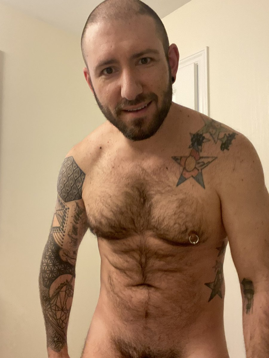 Shaithis Stone taking a naked selfie for his gay JustFor.Fans content creation