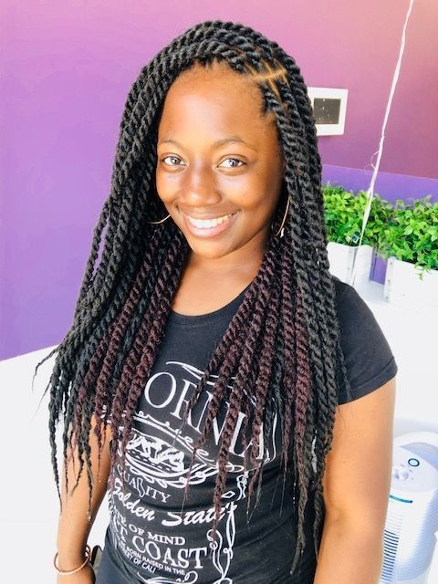 Gorgeous photo of a smiling lady with the side parted hairstyle