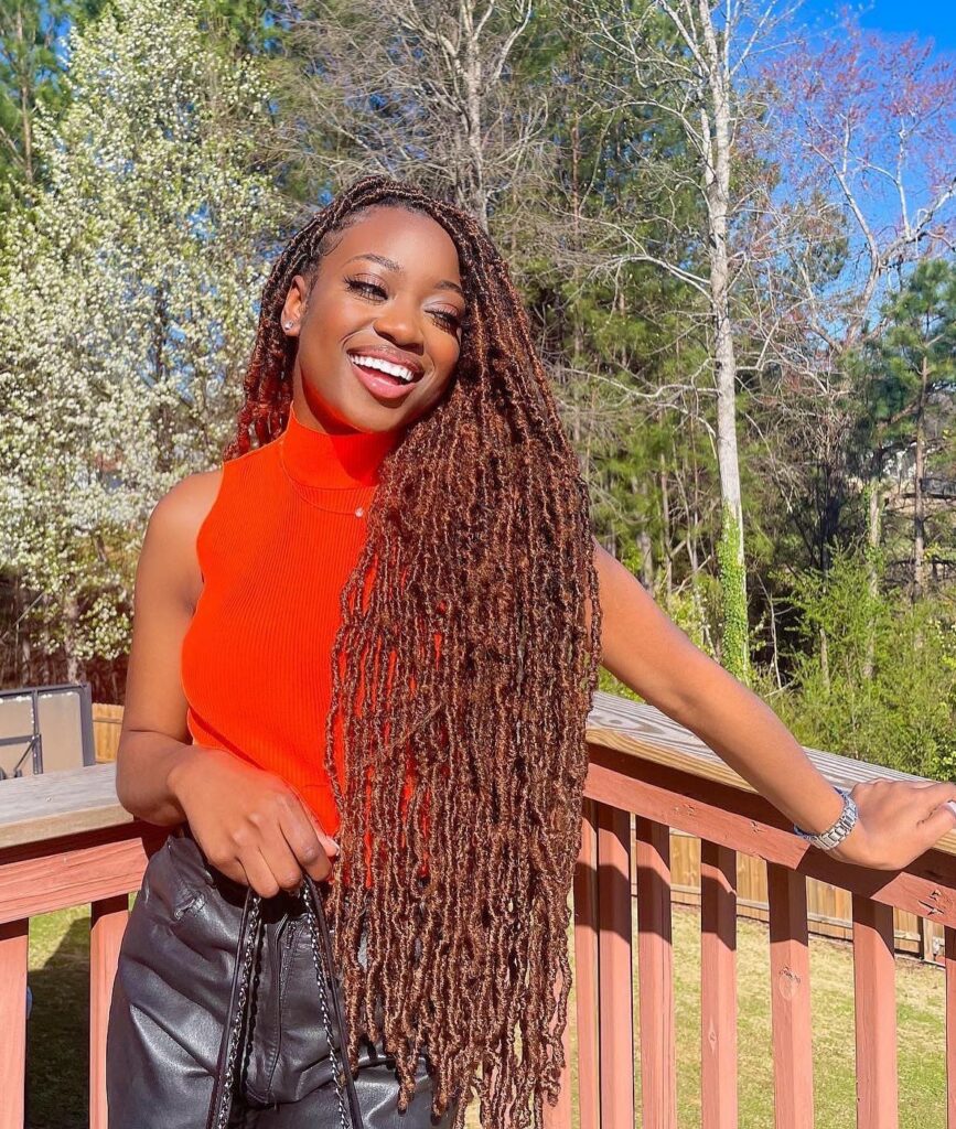 Brown Locs On Dark Skin is a style with brown braids