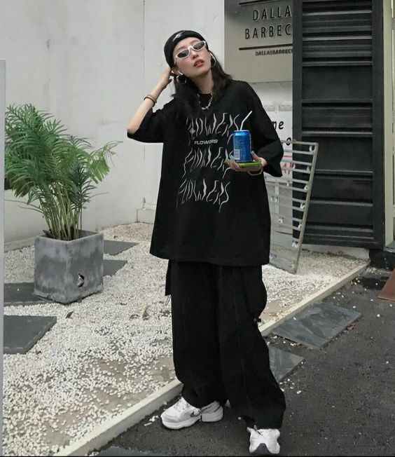 Picture of a fashionista rocking a nice tee with the iconic pants 
