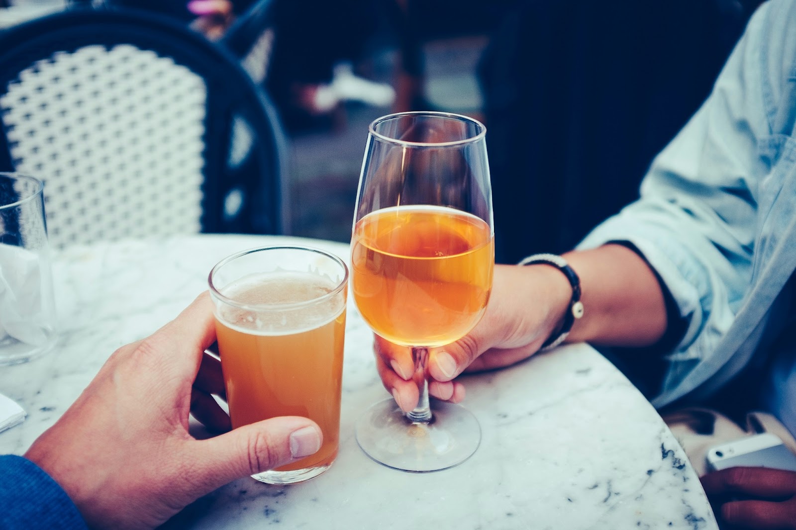  A couple tasting with a glass of local crisp cider. 