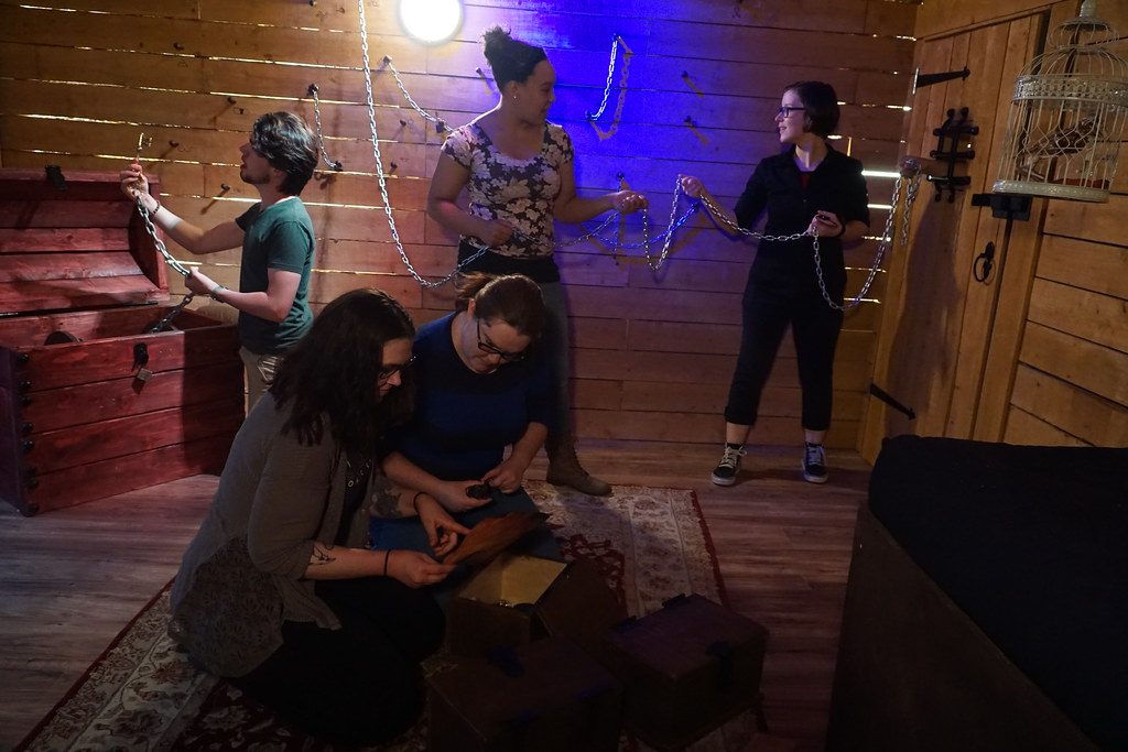A group of friends trying to solve puzzles and win an escape game.  